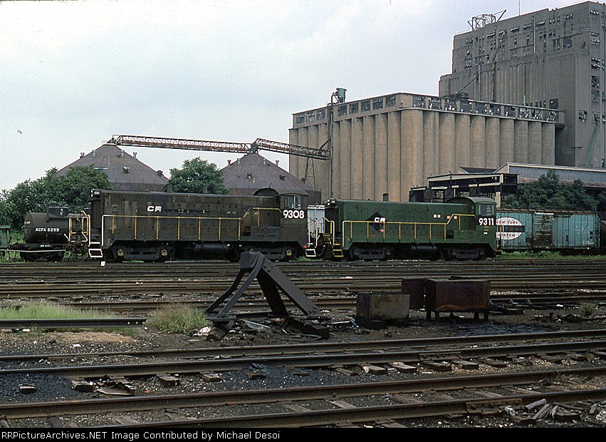 CR VO10E 9308 & 9311 sit in front of the old grain elevator in Port Richmond